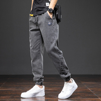 Wiosna lato czarne niebieskie dżinsy Cargo mężczyźni Streetwear Denim spodnie do biegania mężczyźni Baggy Harem Jean spodnie Plus rozmiar 6XL 7XL 8XL 4